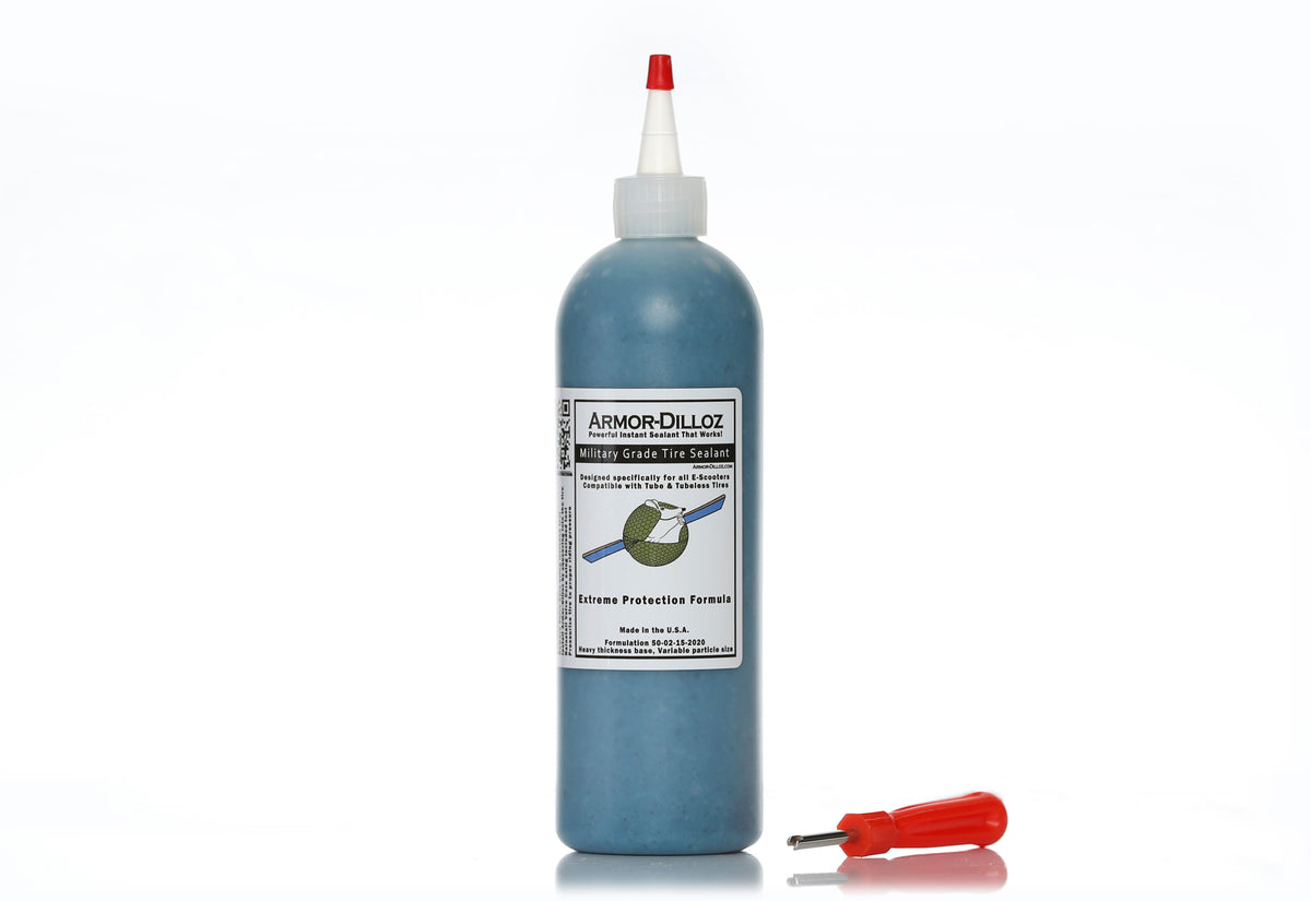 Blue Armor-Dilloz tire sealant, 16 oz bottle with a red-handled valve-core tool