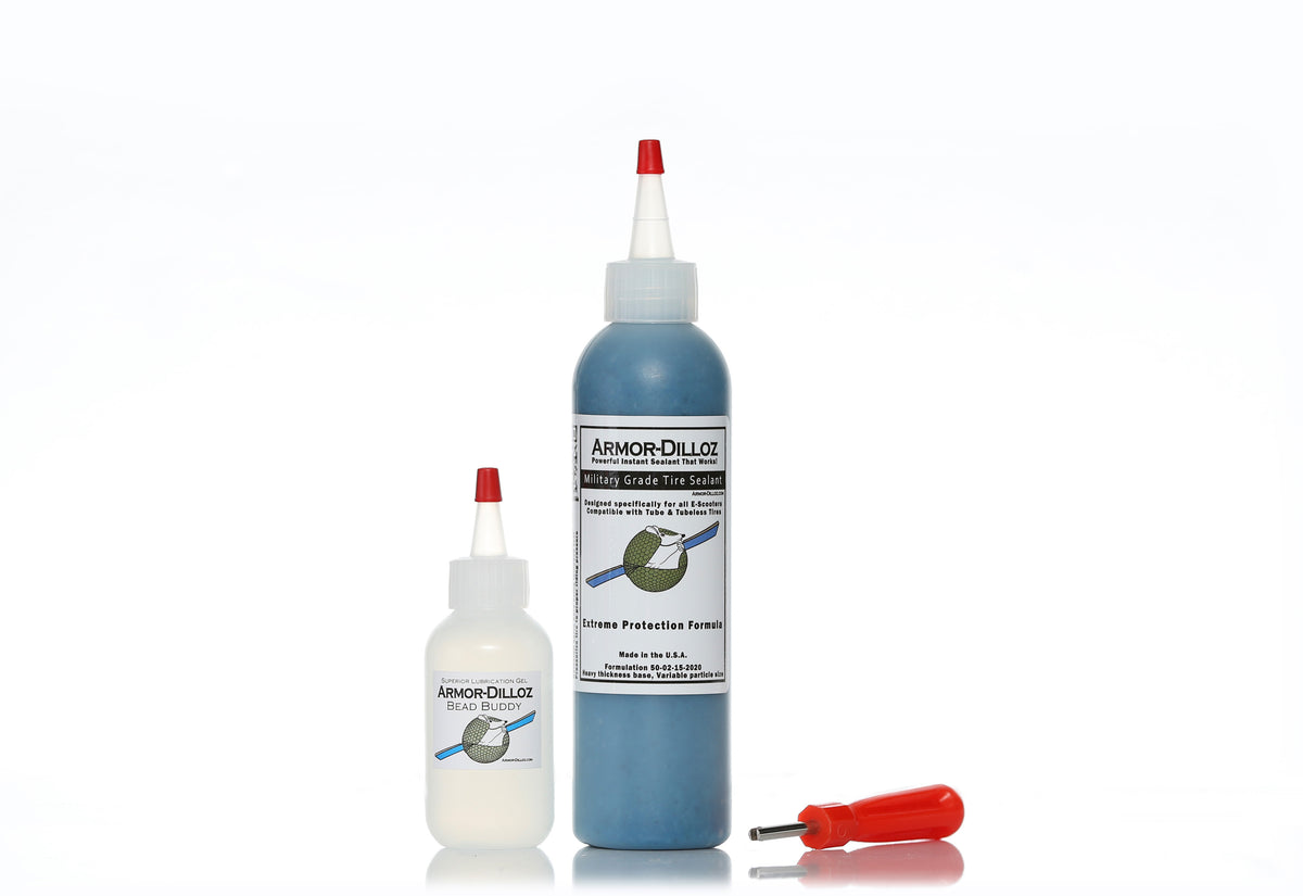 Blue Armor-Dilloz tire sealant, 8 oz bottle with Bead Buddy and a red-handled valve-core tool