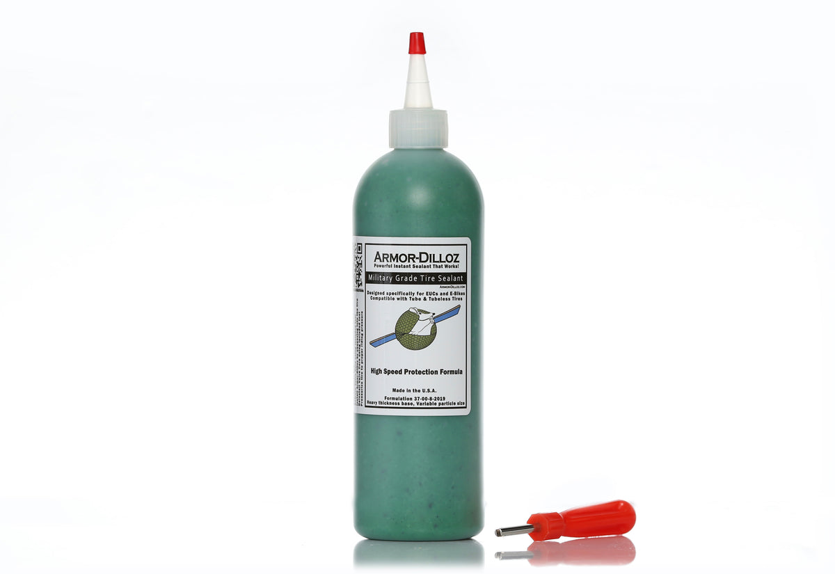 Green Armor-Dilloz tire sealant, 16 oz bottle with a red-handled valve-core tool