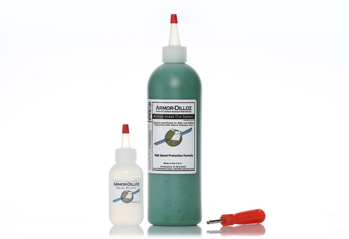 Green Armor-Dilloz tire sealant, 16 oz bottle with Bead Buddy and a red-handled valve-core tool