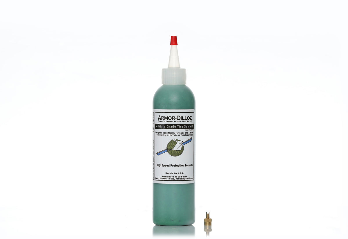 Green Armor-Dilloz tire sealant, 8 oz bottle with a brass valve-core tool