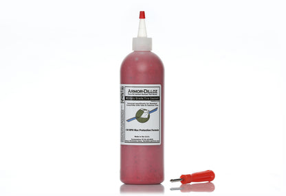 Red Armor-Dilloz tire sealant, 16 oz bottle with a red-handled valve-core tool