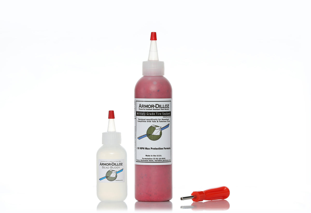 Red Armor-Dilloz tire sealant, 8 oz bottle with Bead Buddy and a red-handled valve-core tool