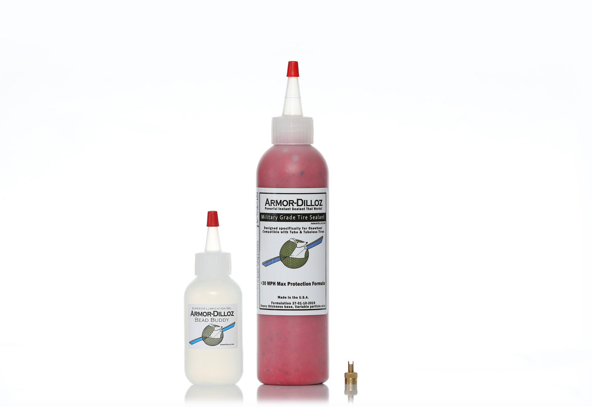 Red Armor-Dilloz tire sealant, 8 oz bottle with Bead Buddy and a brass valve-core tool
