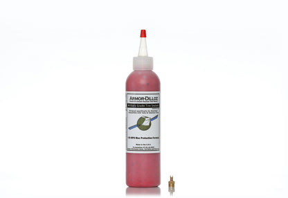 Red Armor-Dilloz tire sealant, 8 oz bottle with a brass valve-core tool
