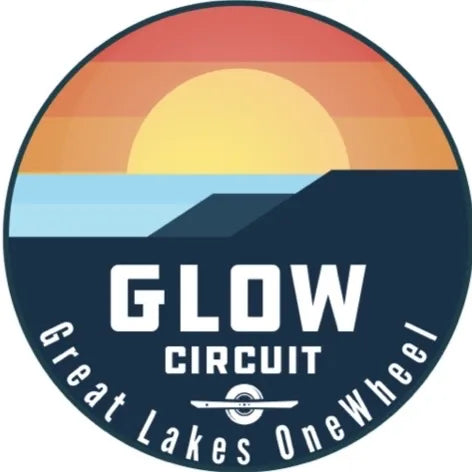 GLOW Circuit Great Lakes Onewheel logo with a sunset over water.