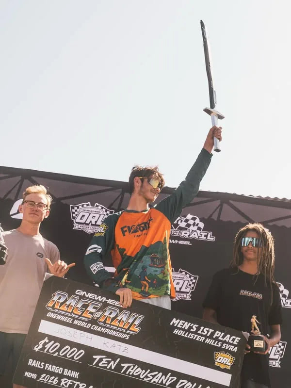 Joseph Katz celebrating with the championship sword on the Race for the Rail podium.