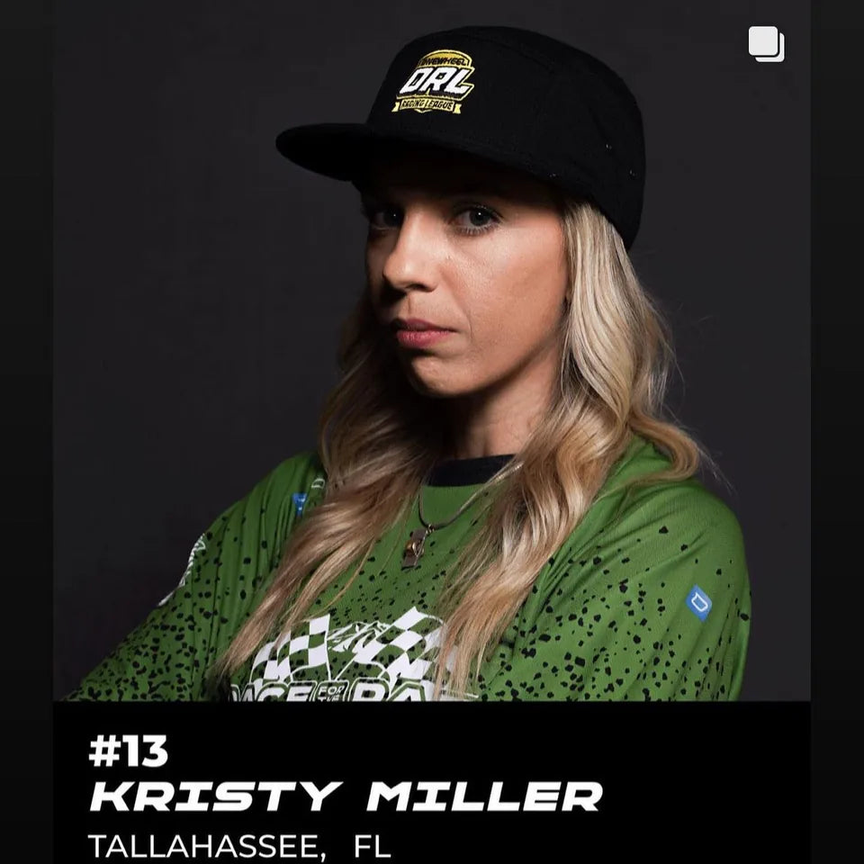 Kristy Miller in her green Race for the Rail jersey and Onewheel Racing League cap.