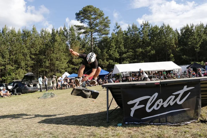 Noah Mead performing a finger flip at Oak City Shred Fest.