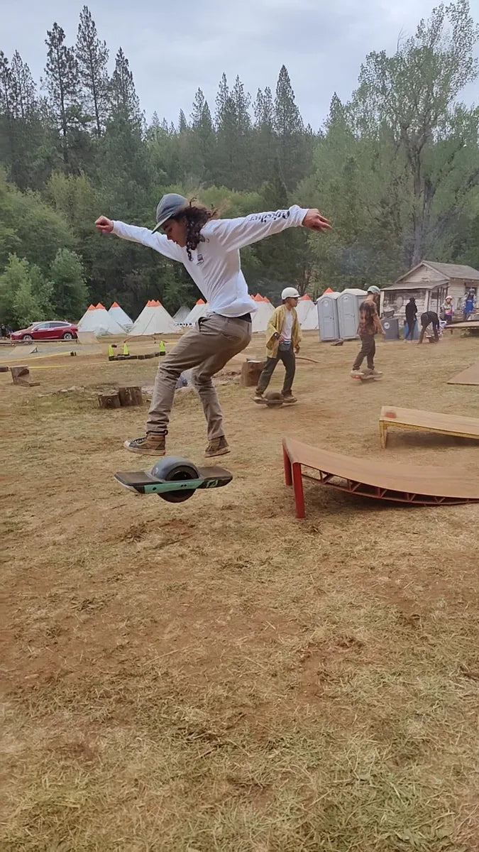 Sam Lara performing a body varial on a Onewheel.