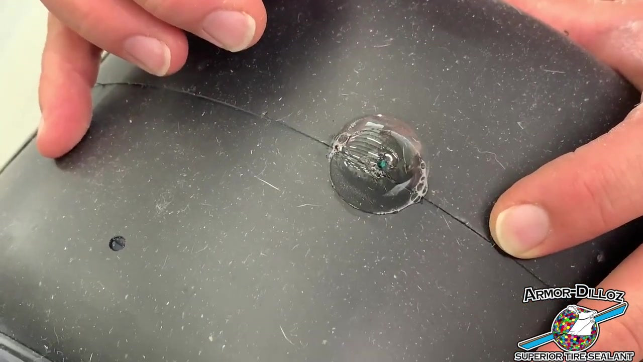 The official 60-second edit shows sealant around the puncture during the Armor-Dilloz Onewheel test.